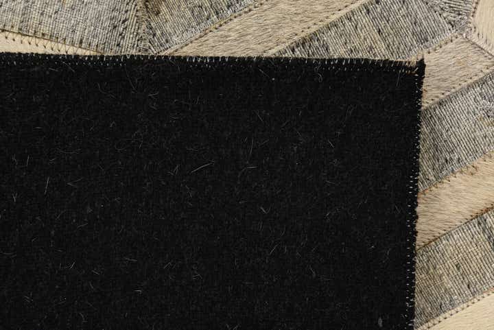 2' 2 x 3' 1 Cowhide Rug