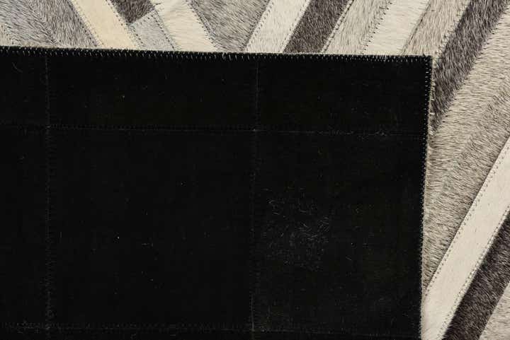5' 1 x 8' Cowhide Rug