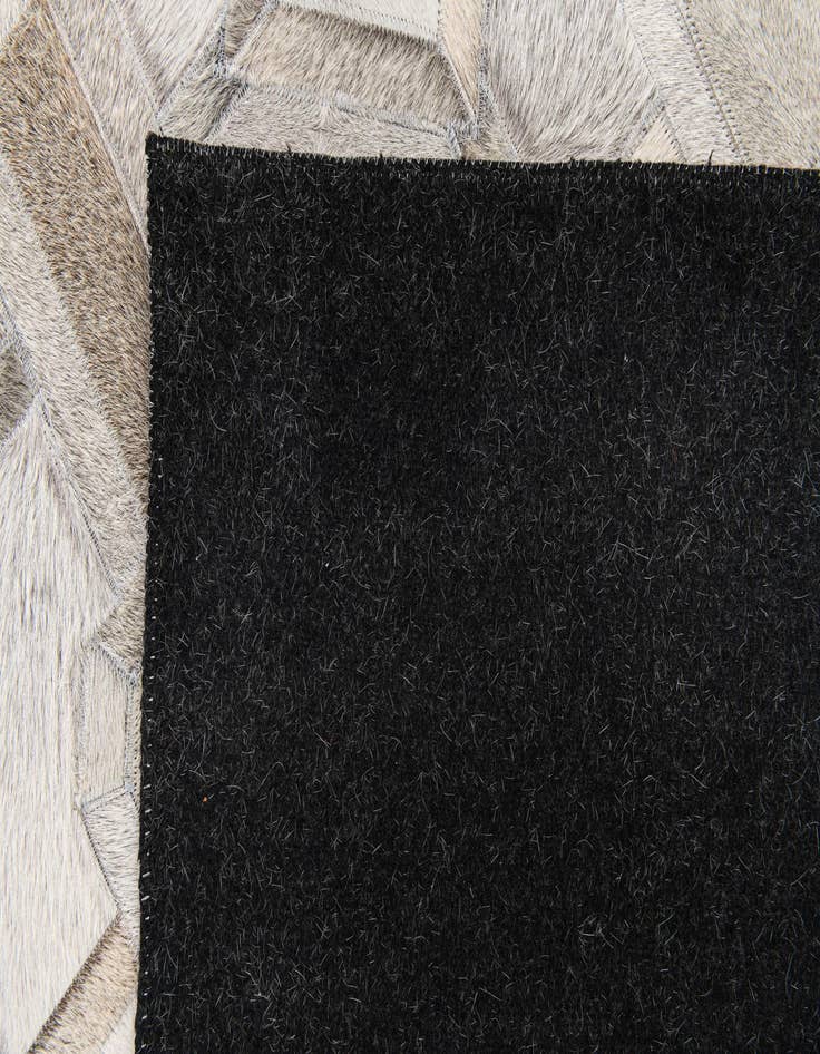 Detail image of 5' 1 x 7' 11 Cowhide Stocks Rug