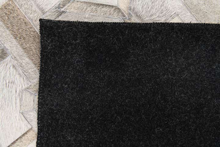 5' 1 x 7' 11 Cowhide Stocks Rug