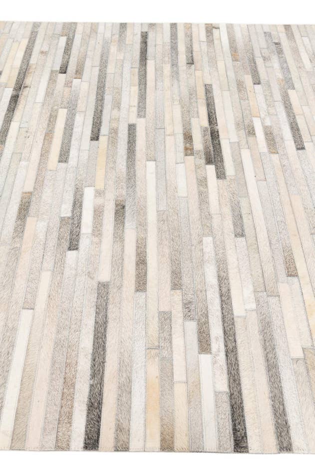 Detail image of 5' 1 x 8' Cowhide Stocks Rug