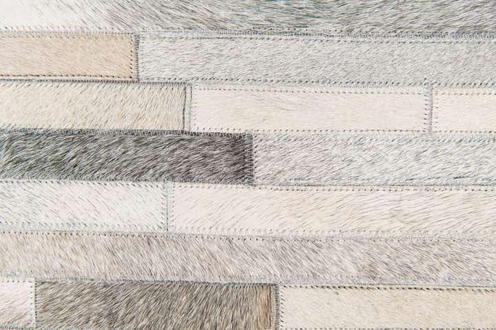 5' 1 x 8' Cowhide Stocks Rug