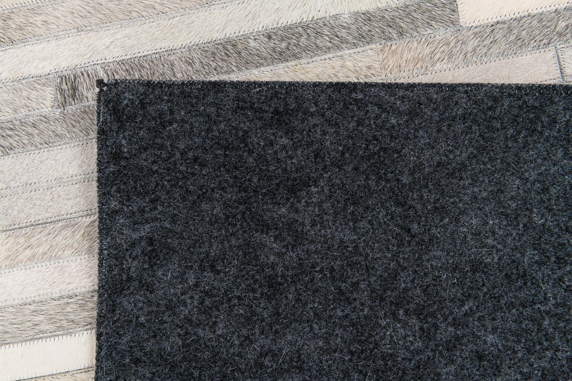 5' 1 x 8' Cowhide Stocks Rug