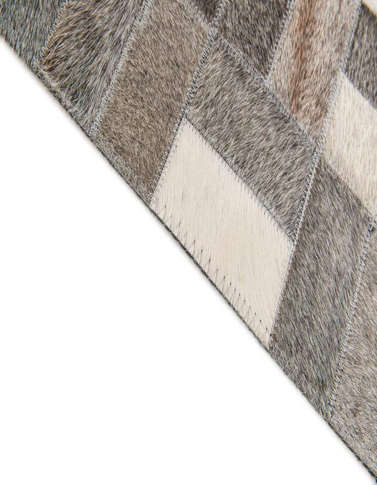 Detail image of 4' 11 x 7' 11 Cowhide Stocks Rug
