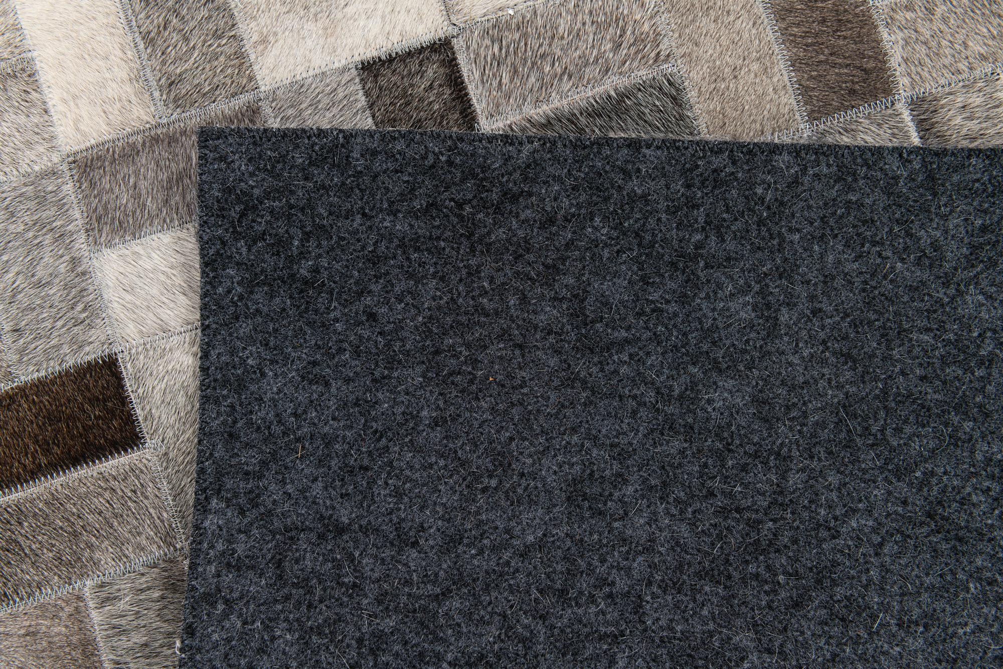 4' 11 x 7' 11 Cowhide Stocks Rug