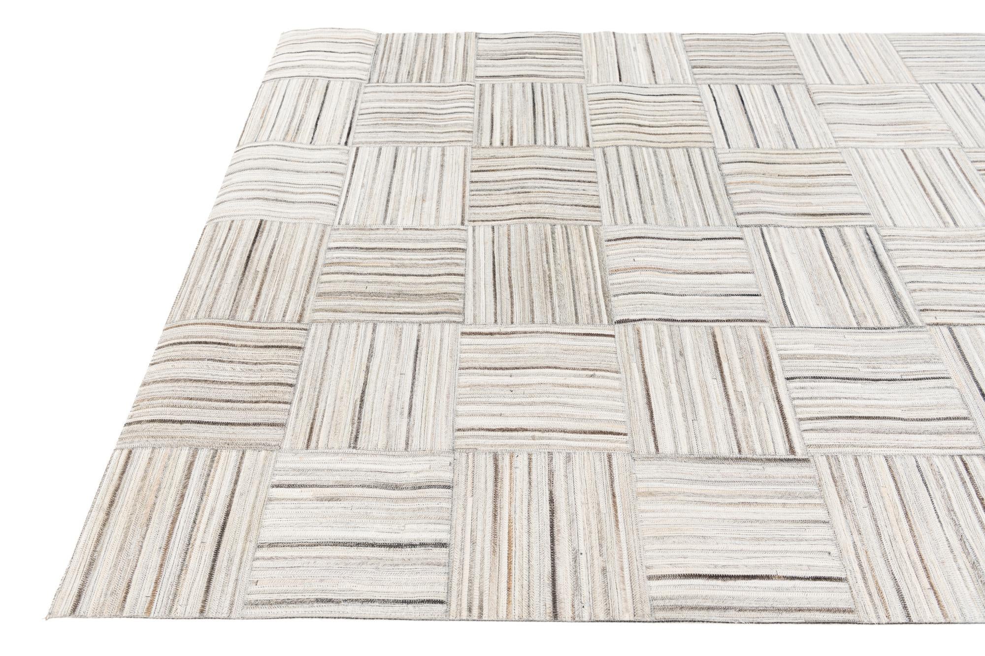 4' 11 x 8' 2 Cowhide Stocks Rug