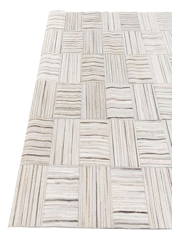 4' 11 x 8' 2 Cowhide Stocks Rug