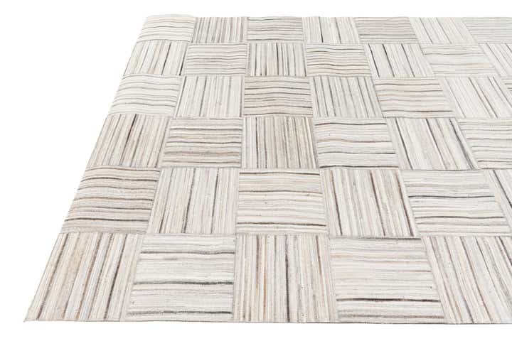 4' 11 x 8' 2 Cowhide Stocks Rug