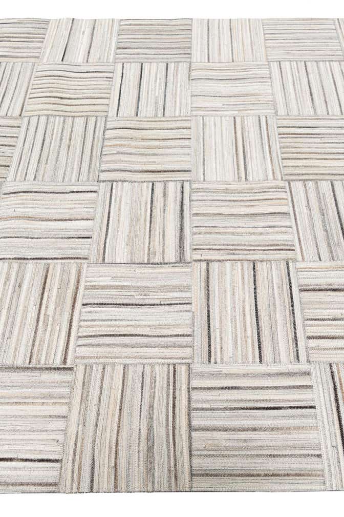 4' 11 x 8' 2 Cowhide Stocks Rug