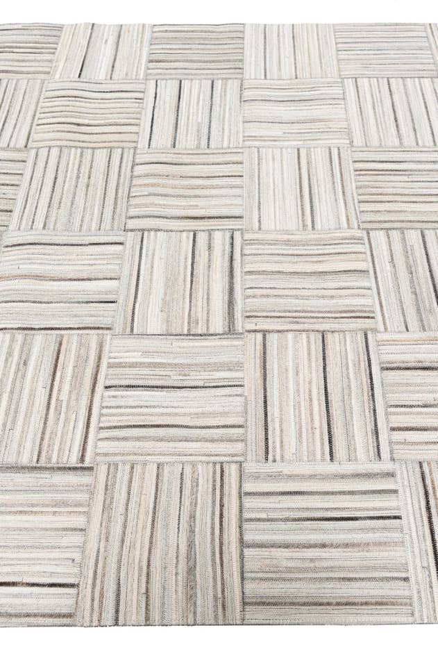 Detail image of 4' 11 x 8' 2 Cowhide Stocks Rug