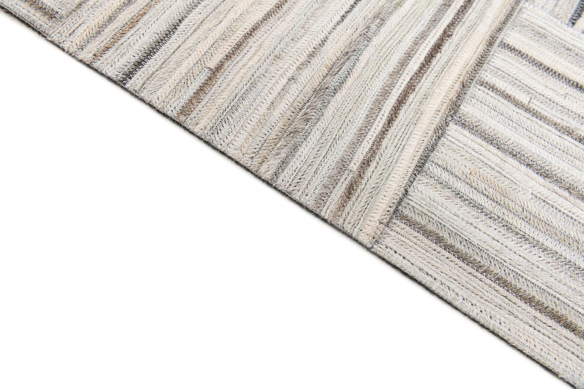 4' 11 x 8' 2 Cowhide Stocks Rug