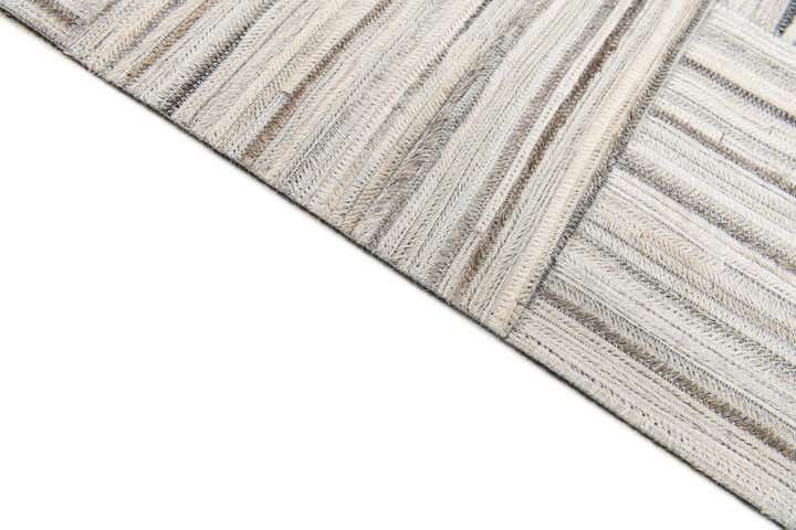 4' 11 x 8' 2 Cowhide Stocks Rug