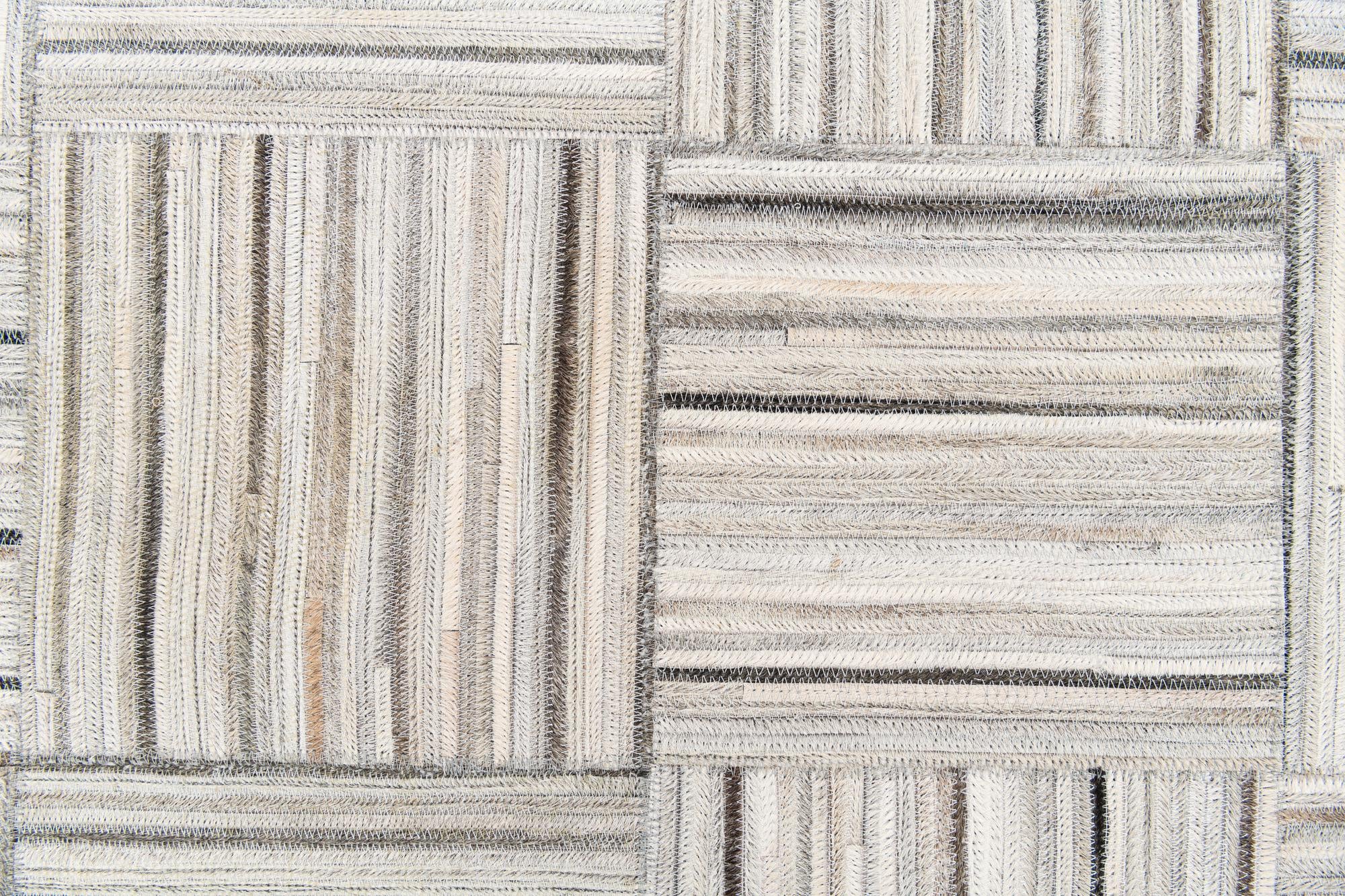 4' 11 x 8' 2 Cowhide Stocks Rug