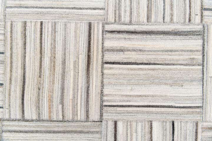4' 11 x 8' 2 Cowhide Stocks Rug