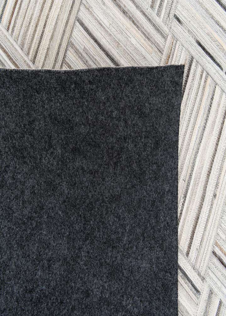 4' 11 x 8' 2 Cowhide Stocks Rug