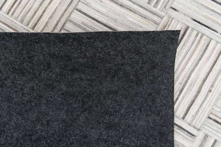 4' 11 x 8' 2 Cowhide Stocks Rug