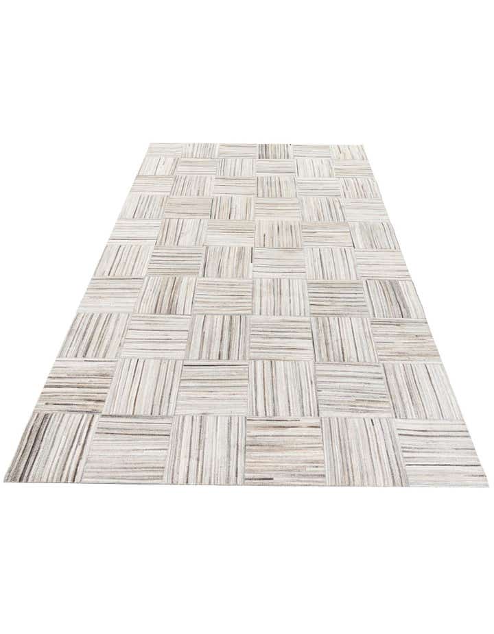 4' 11 x 8' 2 Cowhide Stocks Rug