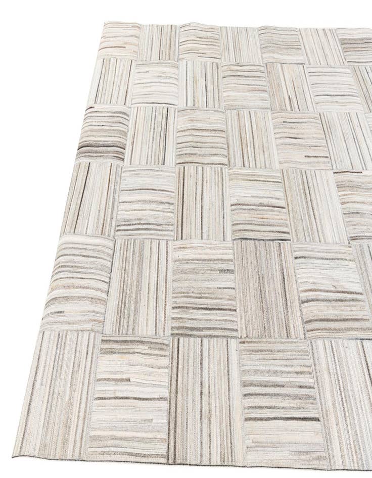 Detail image of 4' 11 x 8' 2 Cowhide Stocks Rug