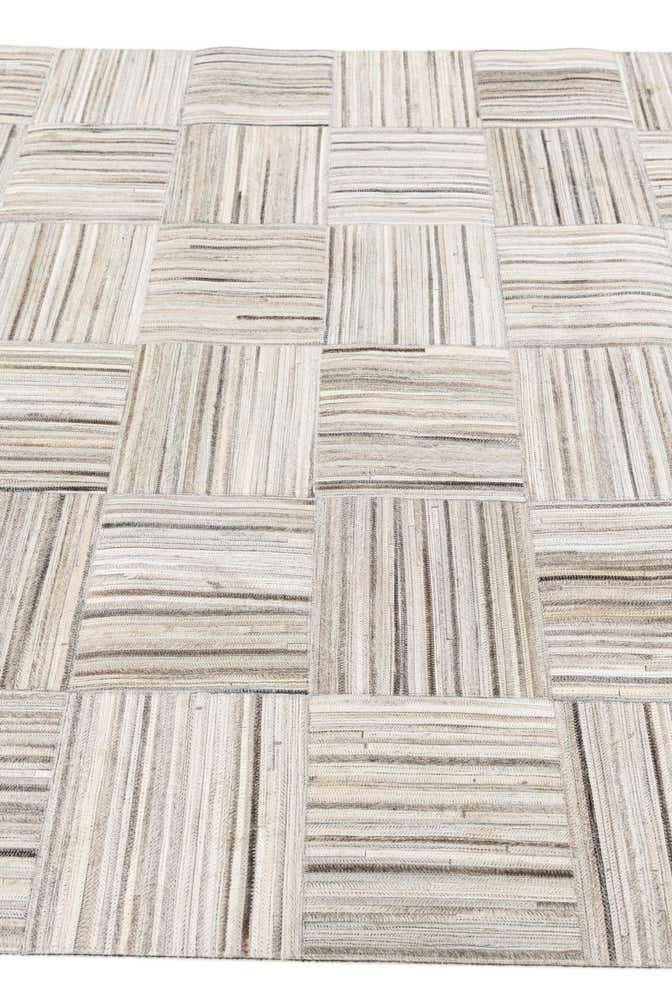 4' 11 x 8' 2 Cowhide Stocks Rug
