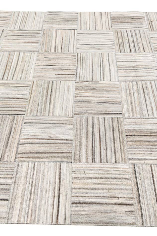 Detail image of 4' 11 x 8' 2 Cowhide Stocks Rug