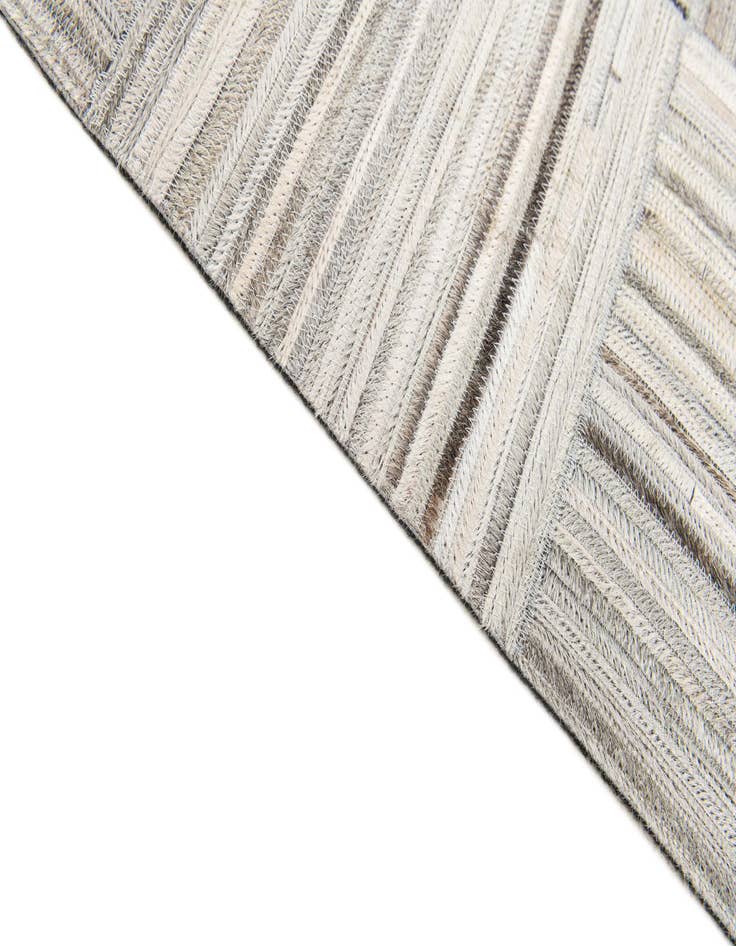 Detail image of 4' 11 x 8' 2 Cowhide Stocks Rug