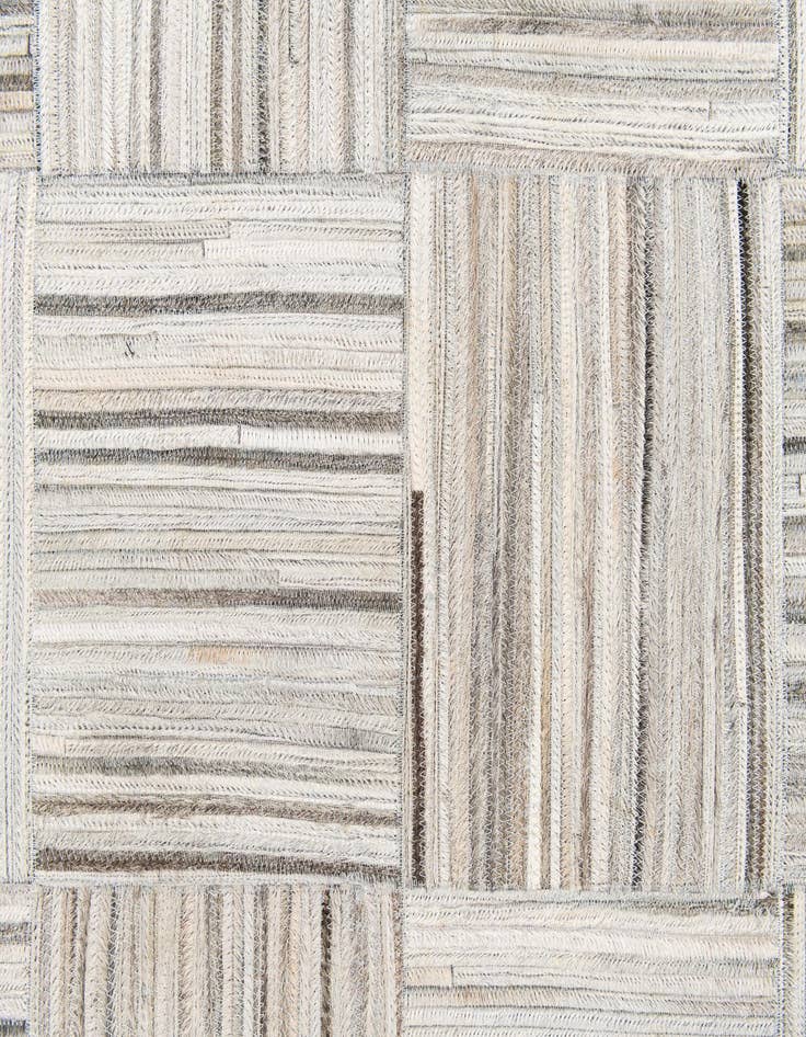 Detail image of 4' 11 x 8' 2 Cowhide Stocks Rug