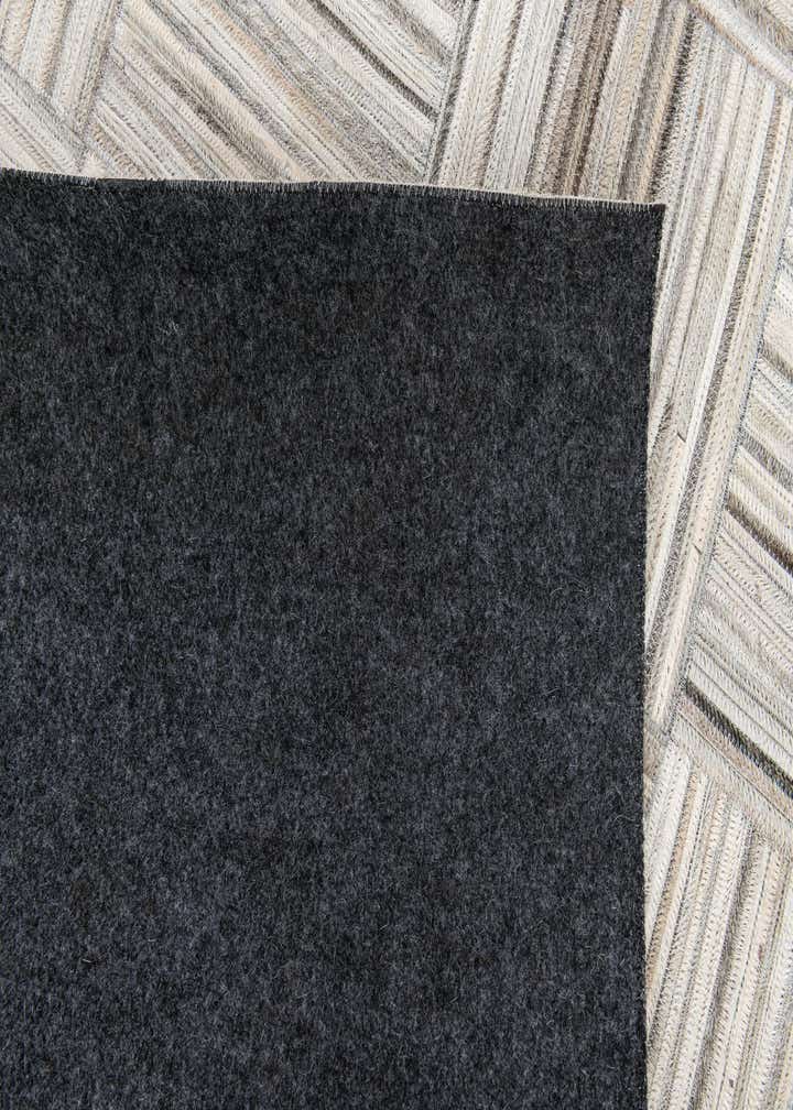 4' 11 x 8' 2 Cowhide Stocks Rug