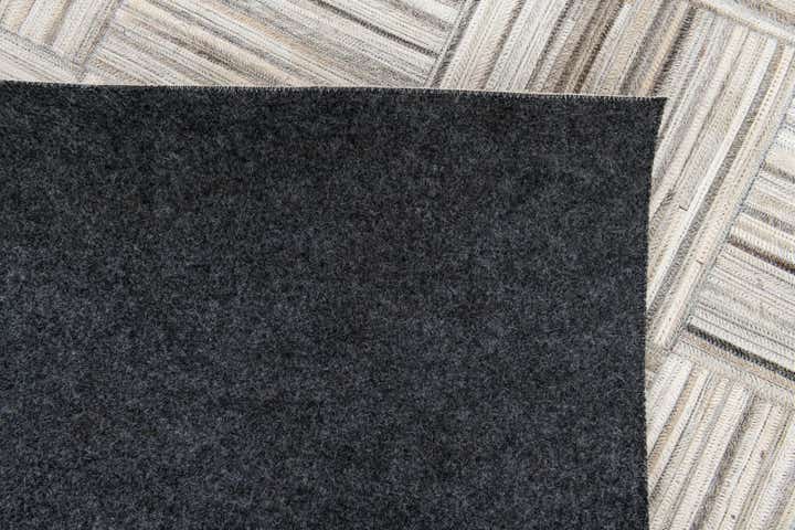 4' 11 x 8' 2 Cowhide Stocks Rug