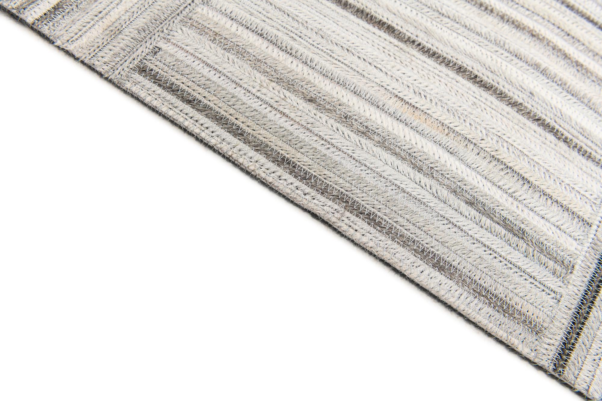 5' x 8' 3 Cowhide Stocks Rug