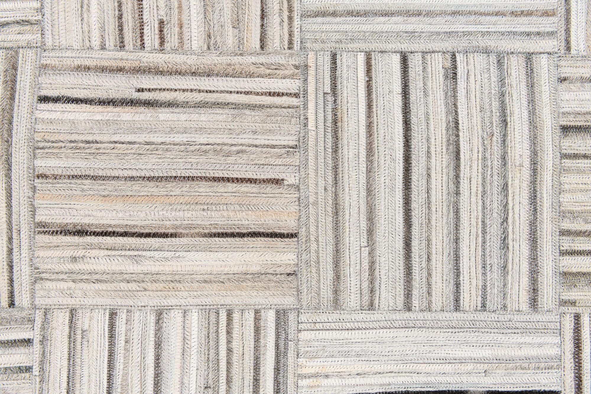 5' x 8' 3 Cowhide Stocks Rug