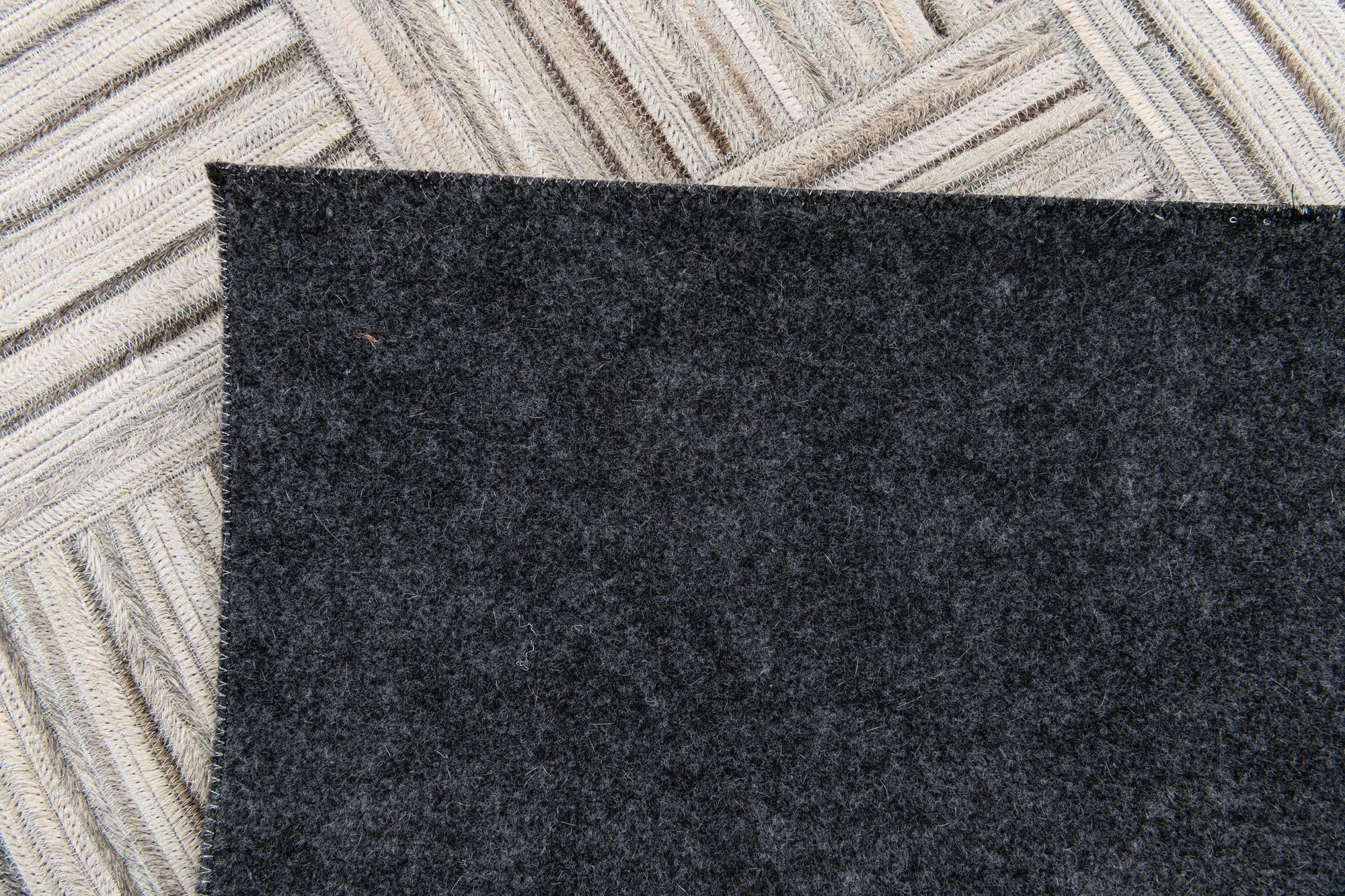 5' x 8' 3 Cowhide Stocks Rug