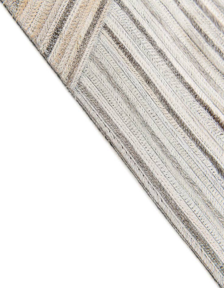 Detail image of 5' x 8' 3 Cowhide Stocks Rug