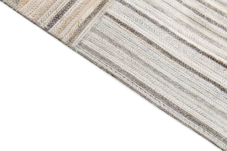 Detail image of 5' x 8' 3 Cowhide Stocks Rug