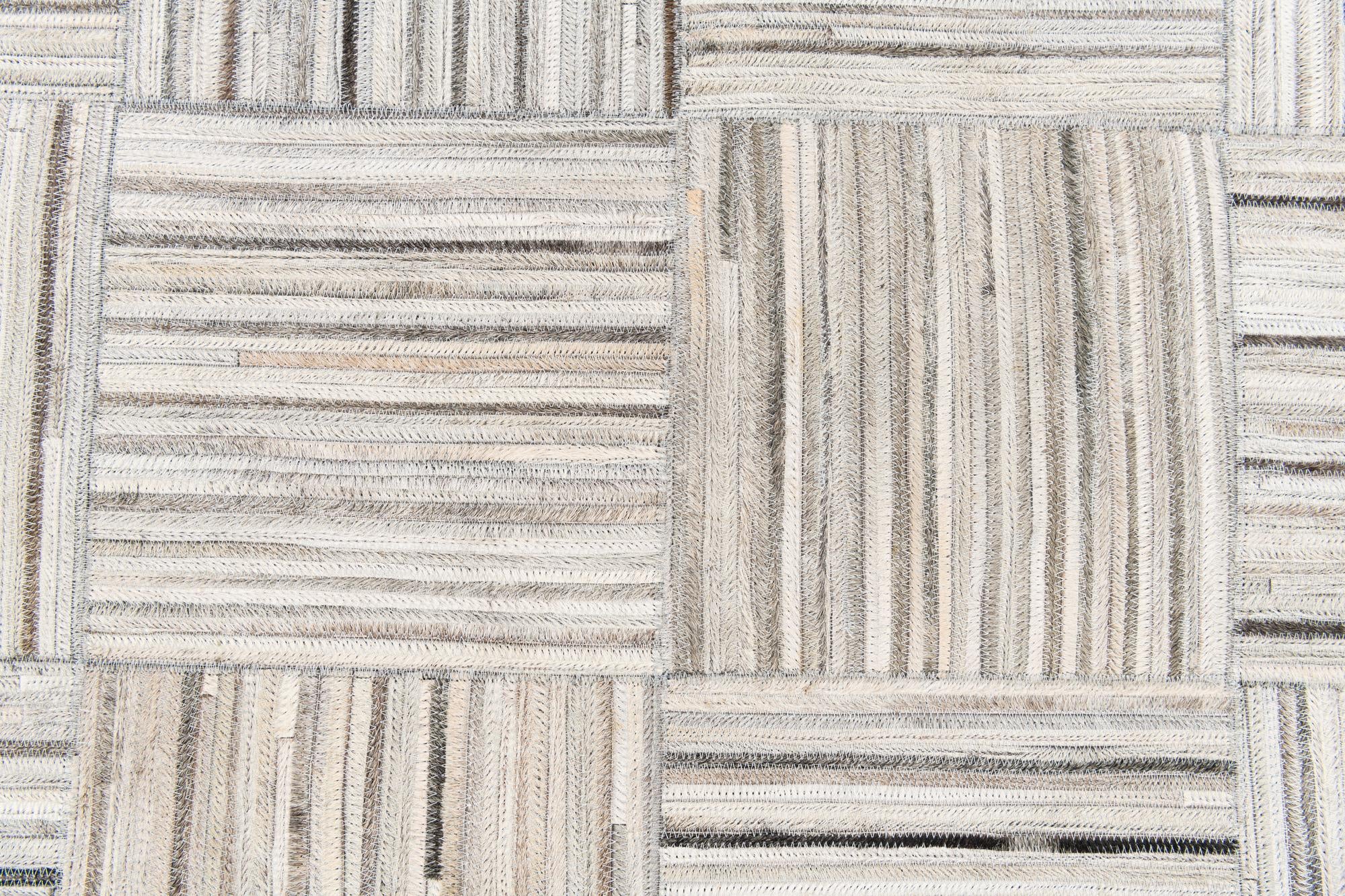 5' x 8' 3 Cowhide Stocks Rug