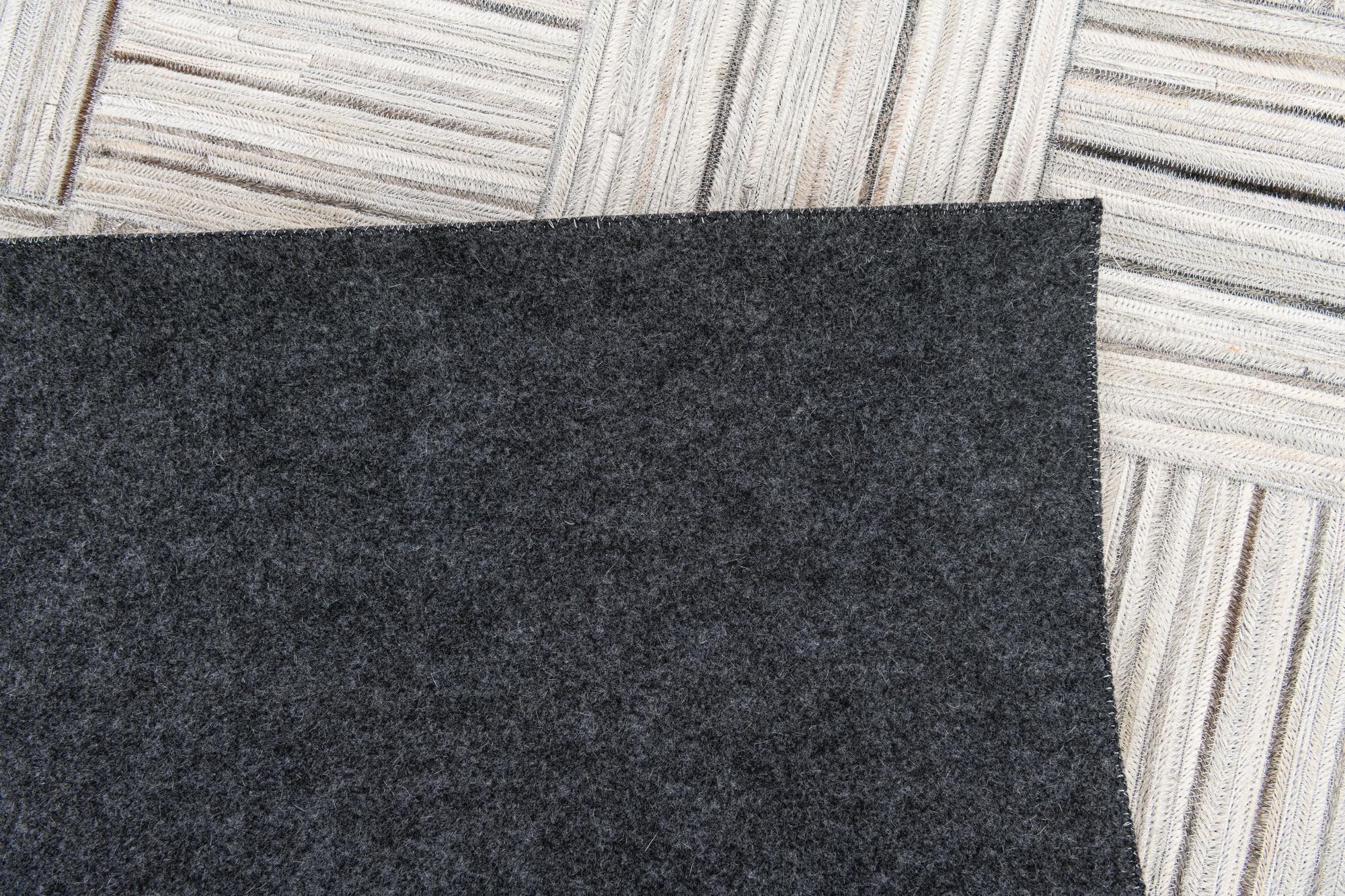 5' x 8' 3 Cowhide Stocks Rug
