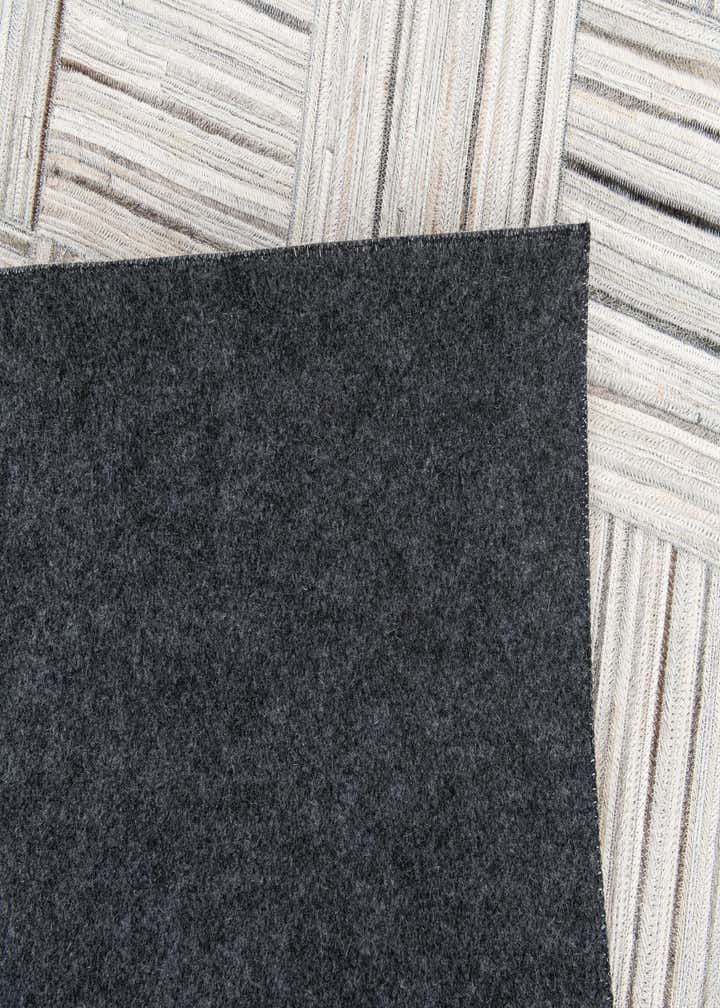 5' x 8' 3 Cowhide Stocks Rug