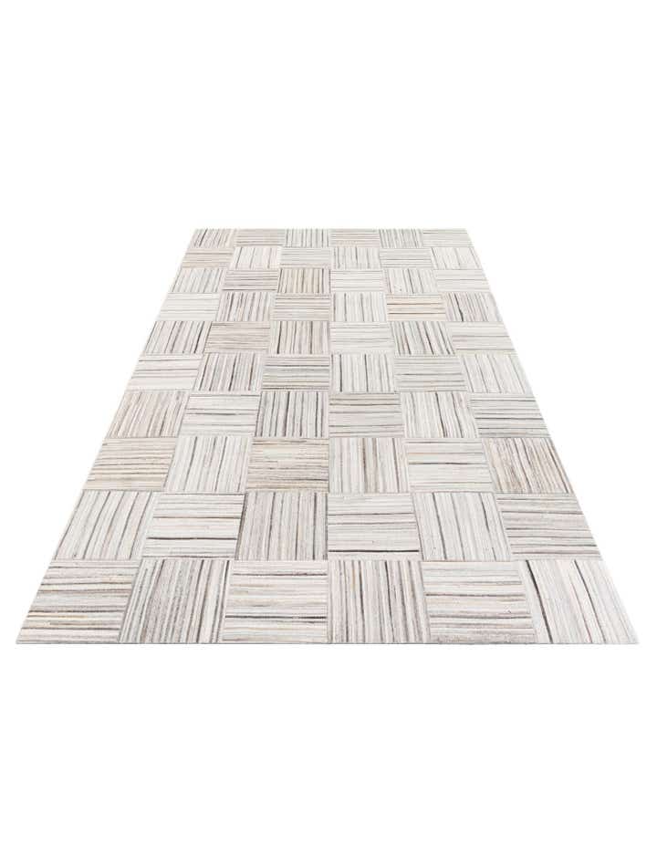 4' 11 x 8' 2 Cowhide Stocks Rug