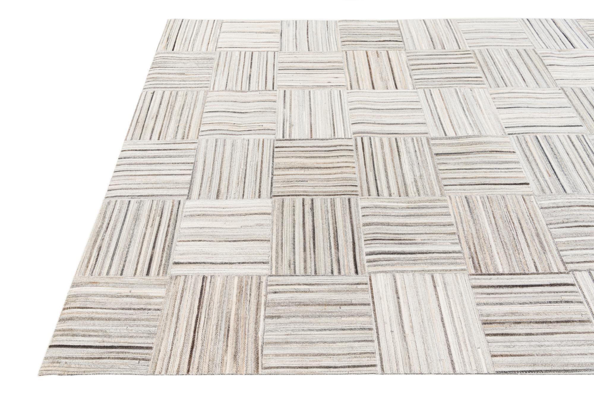 4' 11 x 8' 2 Cowhide Stocks Rug