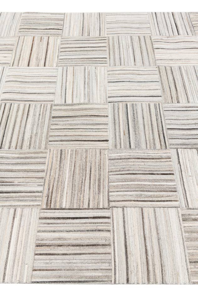 Detail image of 4' 11 x 8' 2 Cowhide Stocks Rug
