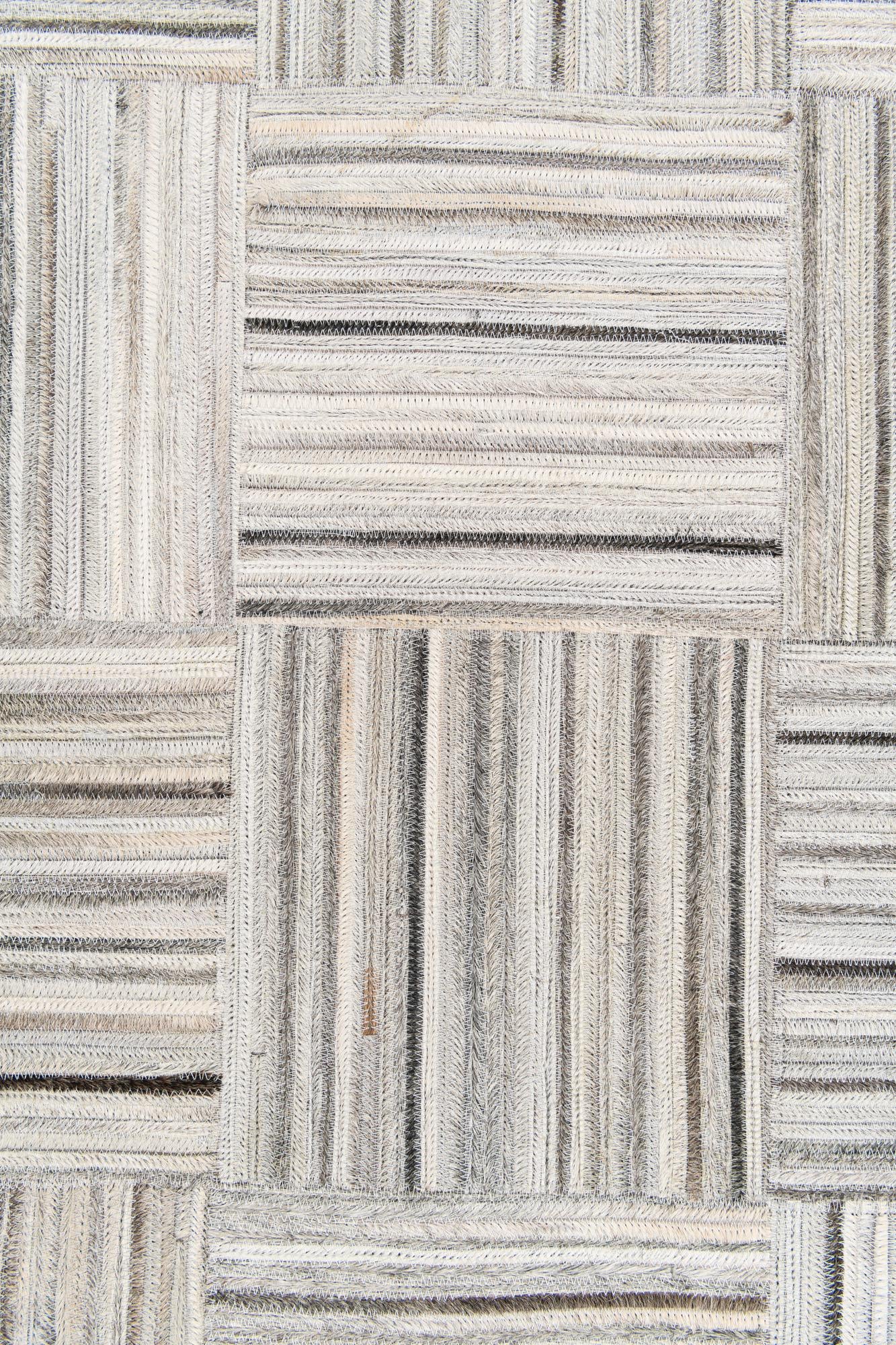 4' 11 x 8' 2 Cowhide Stocks Rug
