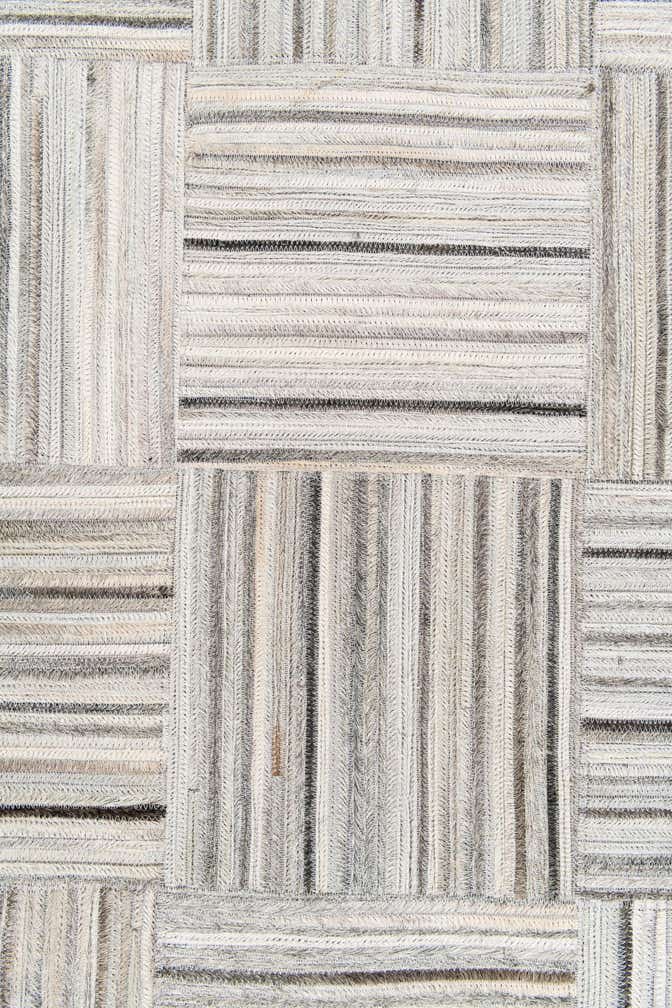 4' 11 x 8' 2 Cowhide Stocks Rug