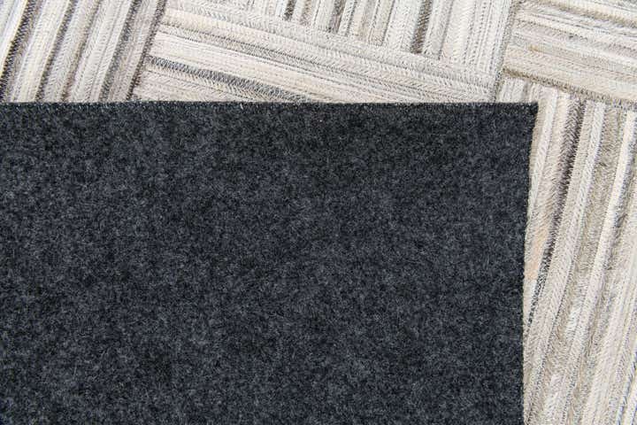 4' 11 x 8' 2 Cowhide Stocks Rug