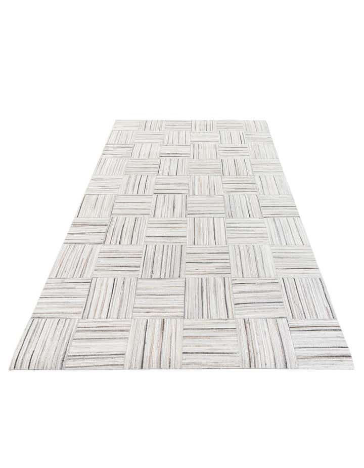 4' 11 x 8' 2 Cowhide Stocks Rug