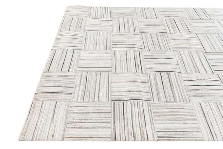4' 11 x 8' 2 Cowhide Stocks Rug