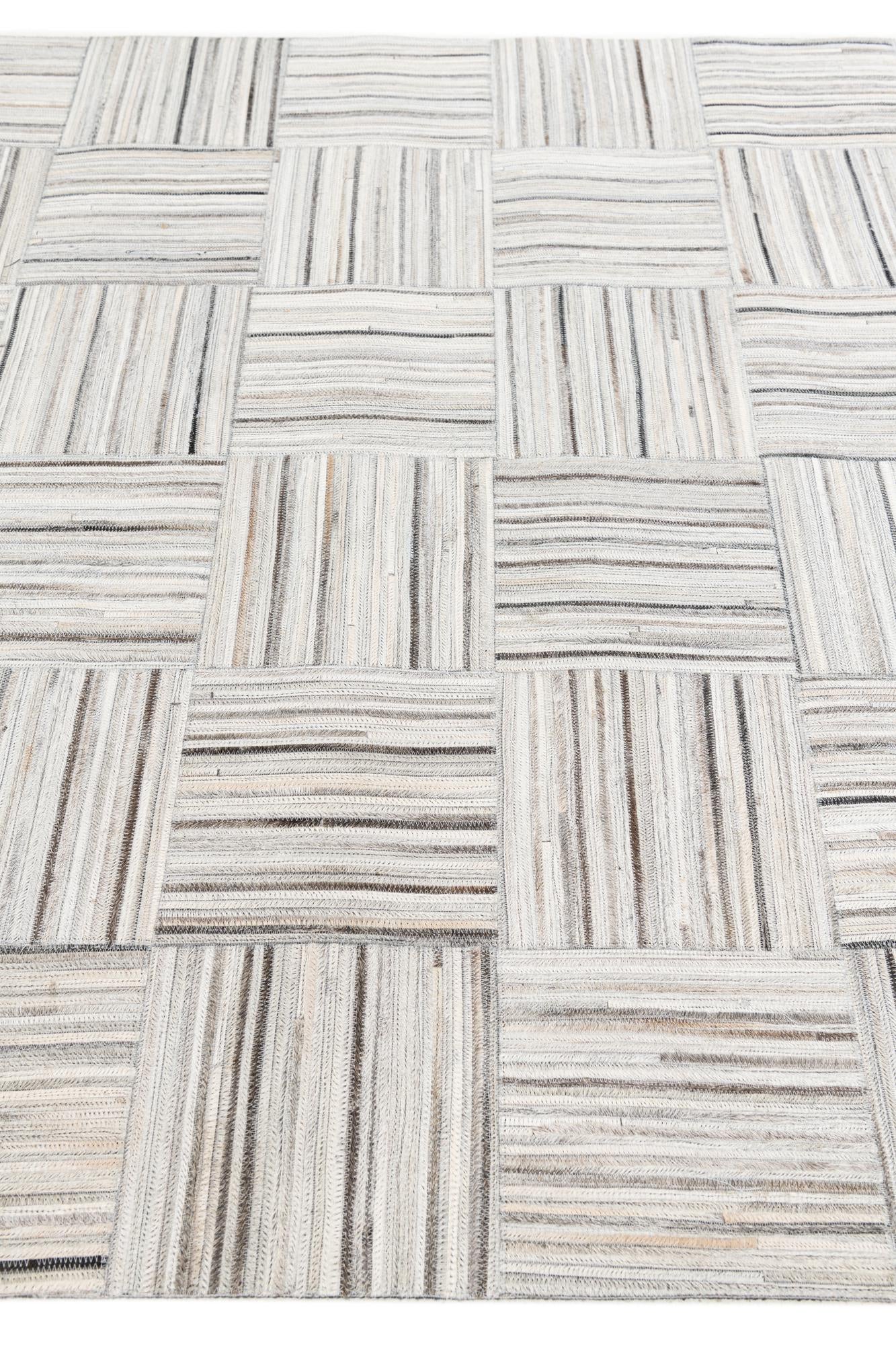 4' 11 x 8' 2 Cowhide Stocks Rug