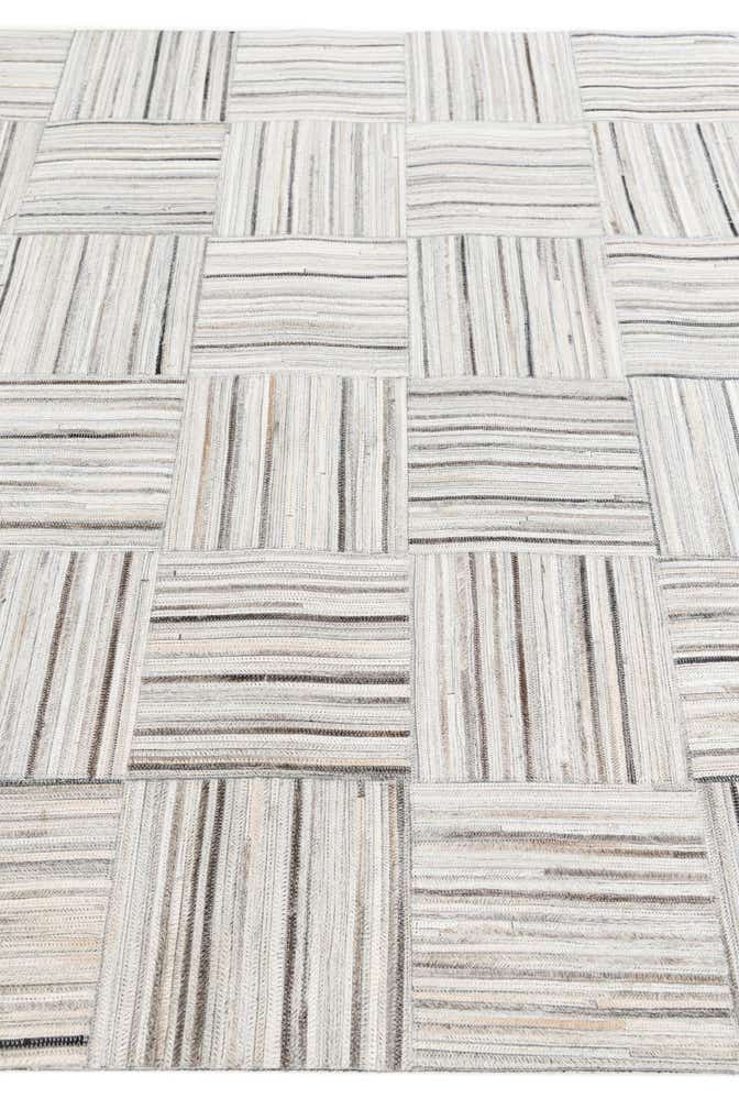 4' 11 x 8' 2 Cowhide Stocks Rug