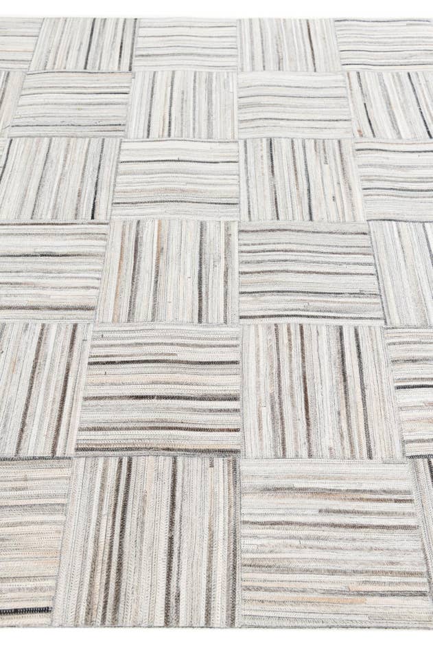 Detail image of 4' 11 x 8' 2 Cowhide Stocks Rug