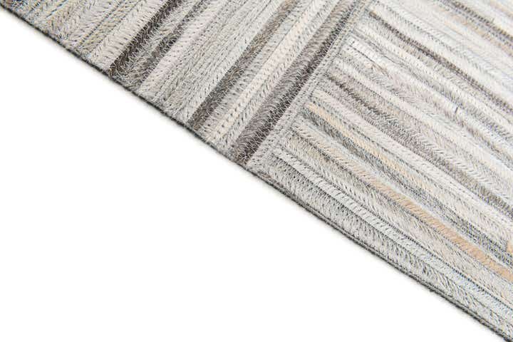4' 11 x 8' 2 Cowhide Stocks Rug