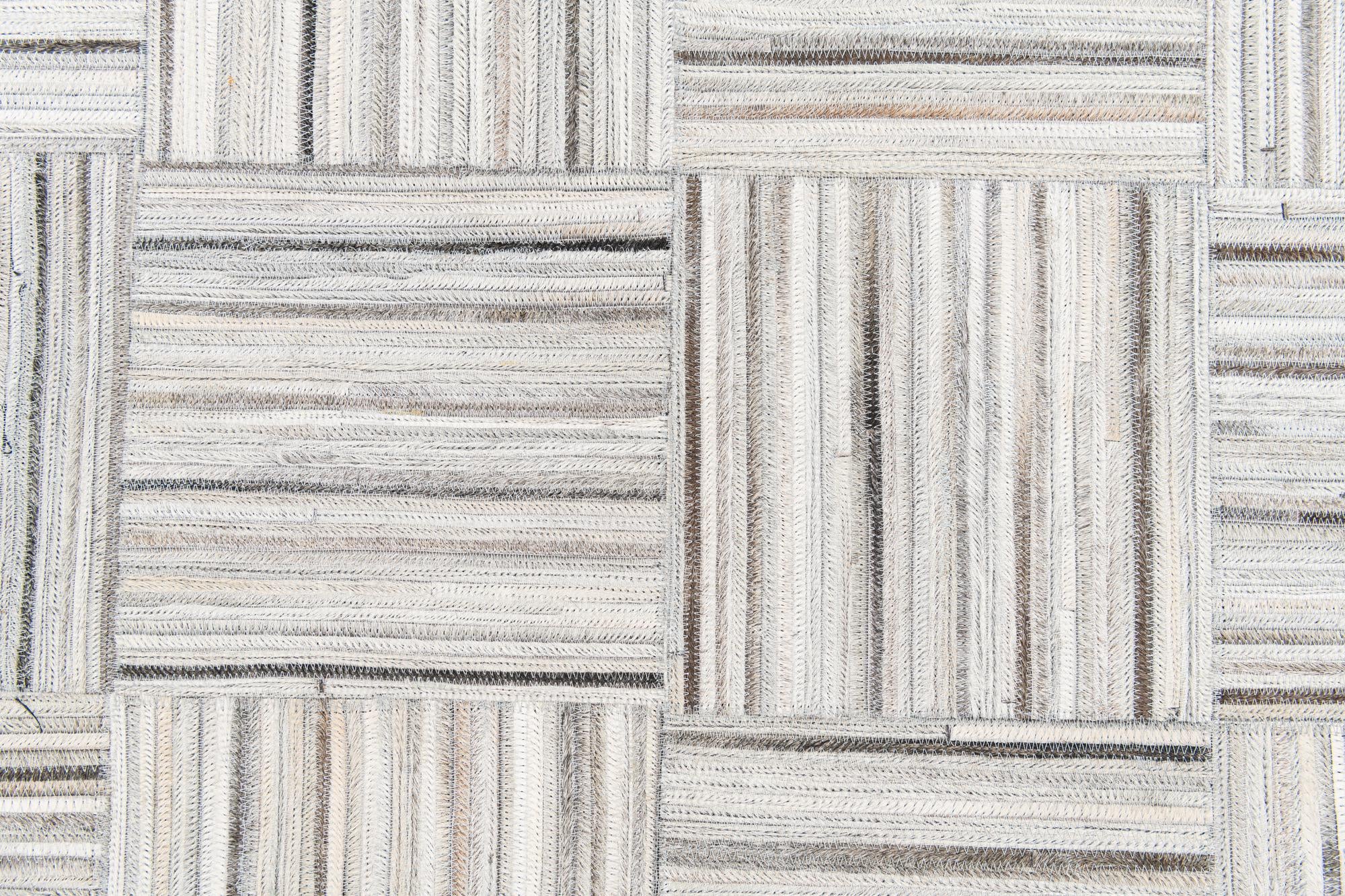 4' 11 x 8' 2 Cowhide Stocks Rug