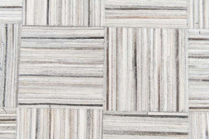 4' 11 x 8' 2 Cowhide Stocks Rug